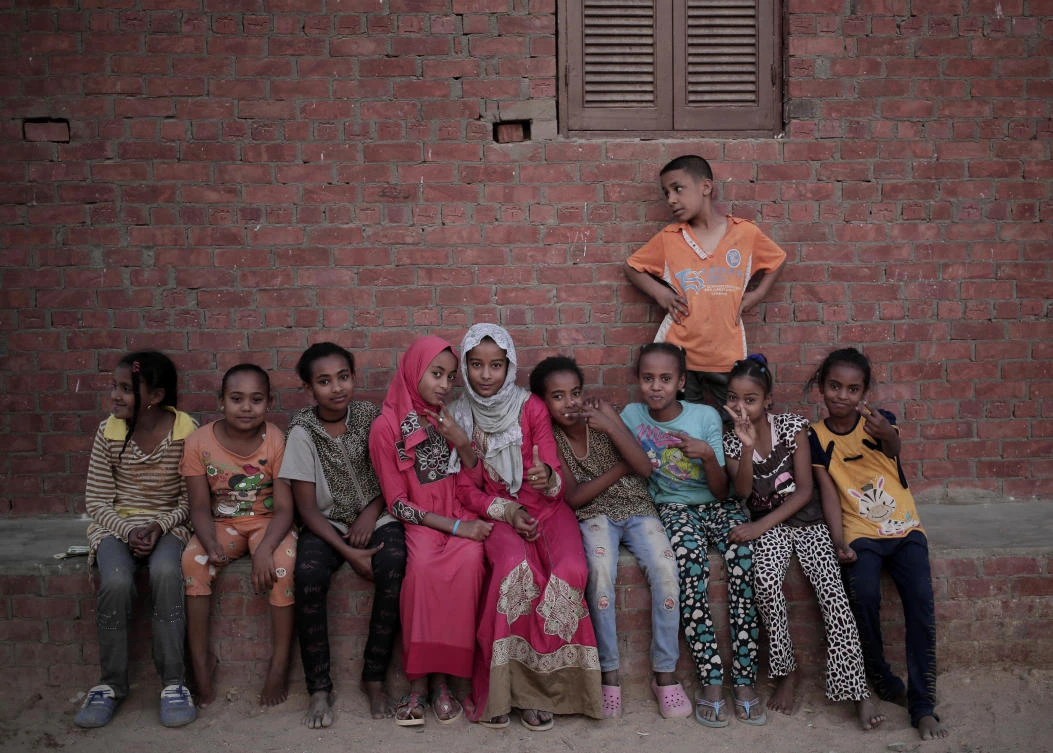 Nubian children pose for photograph in the “tahgeer” Eneiba village, northern Aswan, Egypt. In the 50 years since, the tahgeer towns have become indistinguishable from neighboring Arab ones, a sprawl of dust-covered, eye-sore apartment blocks, mired in poverty and underdevelopment. (AP/Nariman El-Mofty)