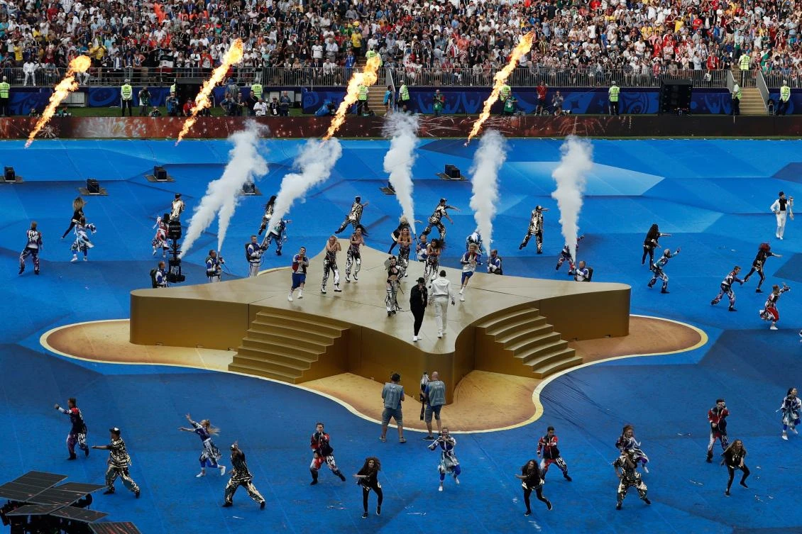 US singer Will Smith (R), Kosovo's singer Era Istrefi (L) and US rapper Nick Rivera Caminero aka Nicky Jam (C) perform during the closing ceremony prior to the Russia 2018 World Cup final football match between France and Croatia at the Luzhniki Stadium in Moscow on July 15, 2018. (AFP)