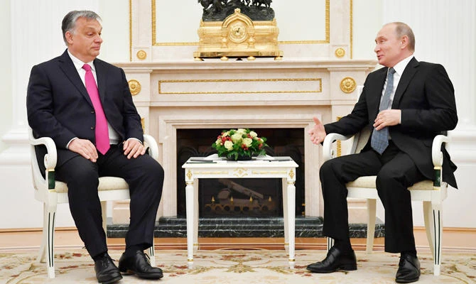 Russian President Vladimir Putin, right, gestures while speaking to Hungarian Prime Minister Viktor Orban during their meeting in the Kremlin in Moscow, Russia, on Sunday, July 15, 2018. (AP)