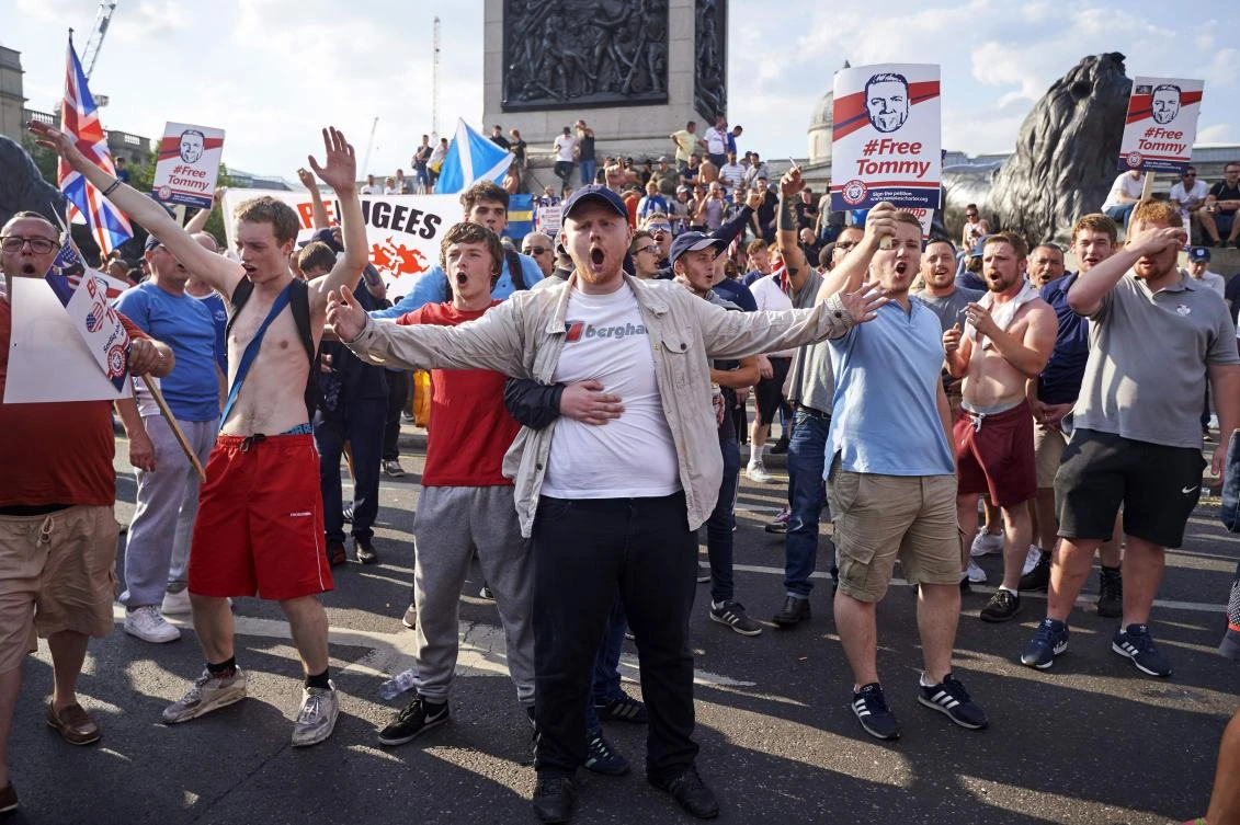 Far-right protesters block bus driven by veiled woman in London