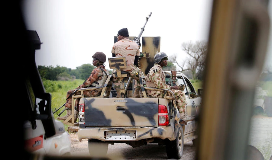 A Nigerian army convoy vehicle drives ahead with an anti-aircraft gun, on the way to Bama, Borno State, Nigeria in this August 31, 2016 file photo. (REUTERS)