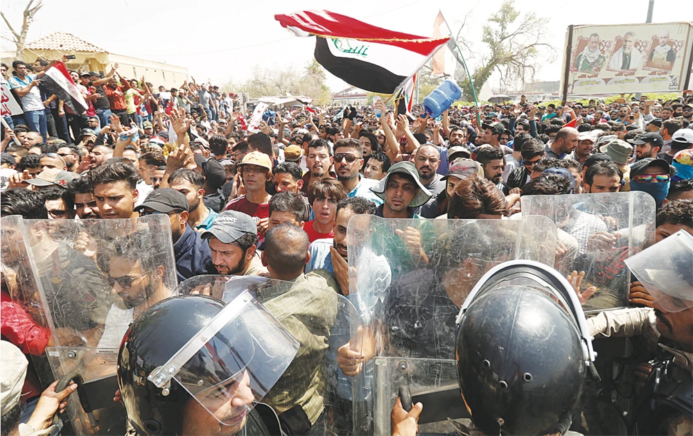 How political forces fueled the spread of Iraq protests