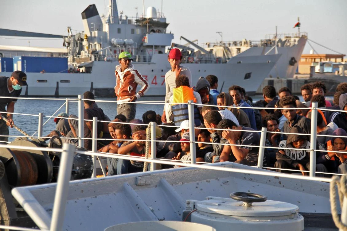 African migrants, who according to the Libyan navy were rescued by the country’s coast guard, arrive at the naval base of the capital Tripoli on July 12. (AFP)