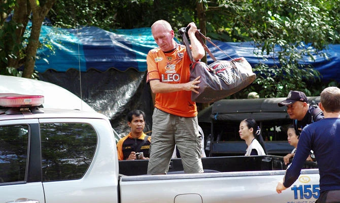 British caver Vernon Unsworth (C) gets out of a pick up truck near the Tham Luang cave complex, in Chiang Rai, Thailand. (REUTERS)