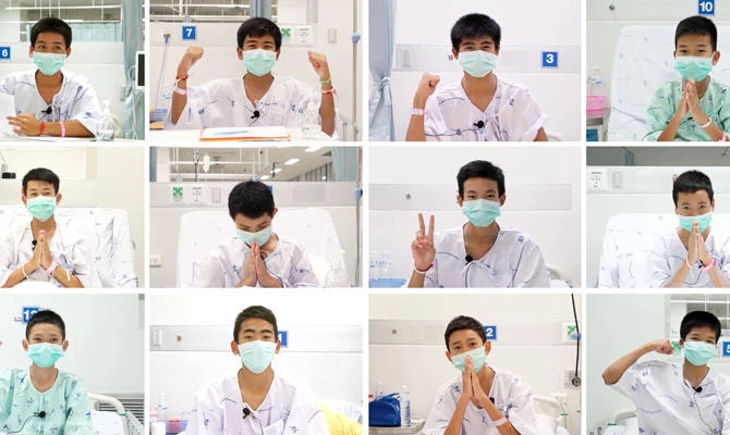 This combo of video grabs compiled from handout footage taken on July 13, 2018 and released by the Ministry of Health, Chiang Rai Prachanukroh Hospital on July 14, 2018 shows rescued "Wild Boars" football team members (top row L to R) Adul Sam-on, 14, Ekkarat Wongsukchan, 14, Phipat Photi, 15, Chanin Wiboonrungrueang, 11, (middle row L to R) Pornchai Khamluang, 16, Duangphet Promthep, 13, Peerapat Sompiengjai, 16, Sompong Jaiwong, 13, (bottom row L to R) Mongkol Boonpiem, 13, Prachak Sutham, 14, Nutthawut Thakamsong, 14, and Phanumas Saengdee, 13, recovering at the hospital in Chiang Rai province. (AFP)