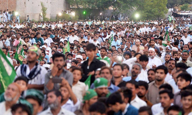 Supporters of Shabaz Sharif, the younger brother of ousted Pakistani Prime Minister Nawaz Sharif and the head of Pakistan Muslim League-Nawaz (PML-N), attend his campaign rally in Pindi Gheb, in the district of Attock, in the Punjab province, on July 19, 2018, ahead of Pakistan's election. (AFP)