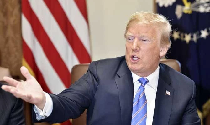 US President Donald Trump speaks during a cabinet meeting on July 18, 2018, at the White House in Washington, DC. (AFP)