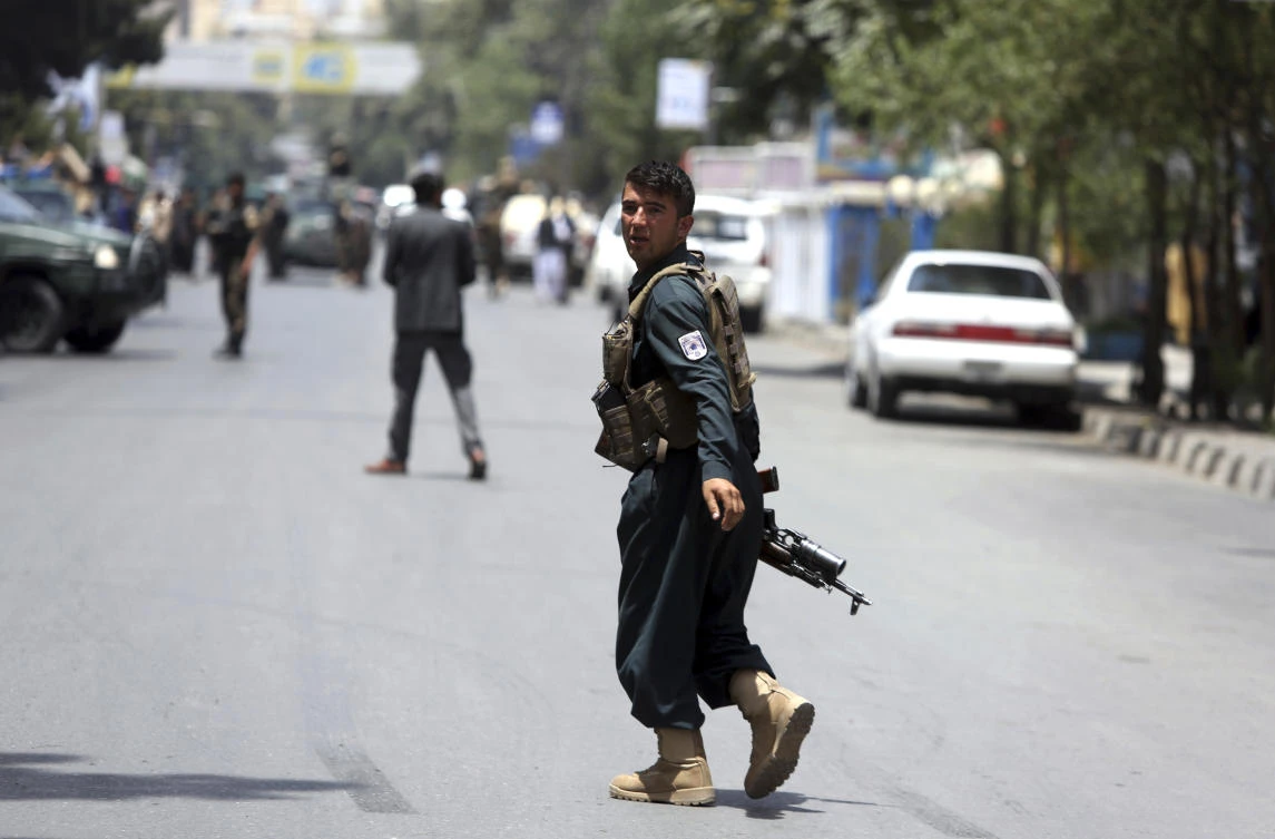 A security personnel looks back as he arrives at the site of a would-be suicide attack near a park, in Kabul, Afghanistan, Monday, July 16, 2018. (AP)
