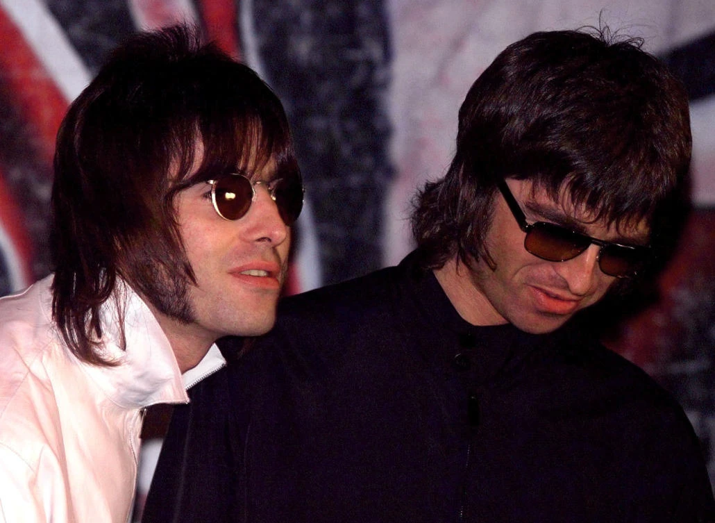 Brothers Liam, left, and Noel Gallagher were bandmates at the British rock band Oasis until they split in 2009. (Reuters)
