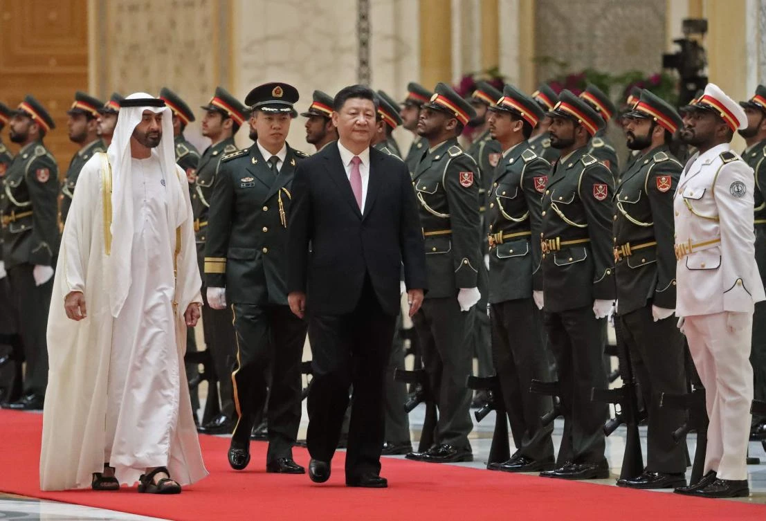 Sheikh Mohammed bin Zayed Al-Nahyan welcomes President Xi Jinping to Abu Dhabi. (AFP)