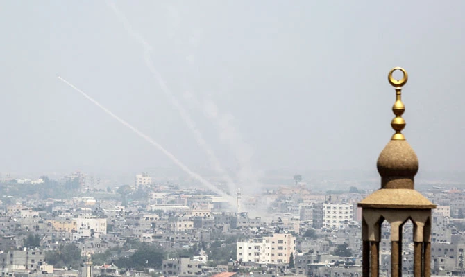 A photo taken on July 14, 2018 shows Palestinian rockets being fired from Gaza City towards Israel. (AFP)