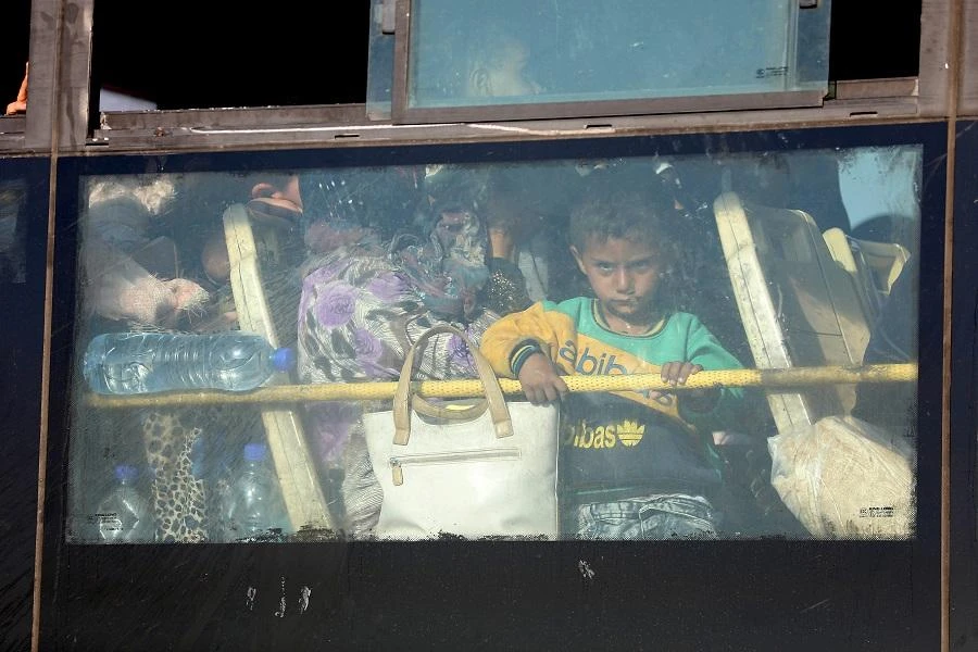 Opposition fighters reach north Syria after south evacuations