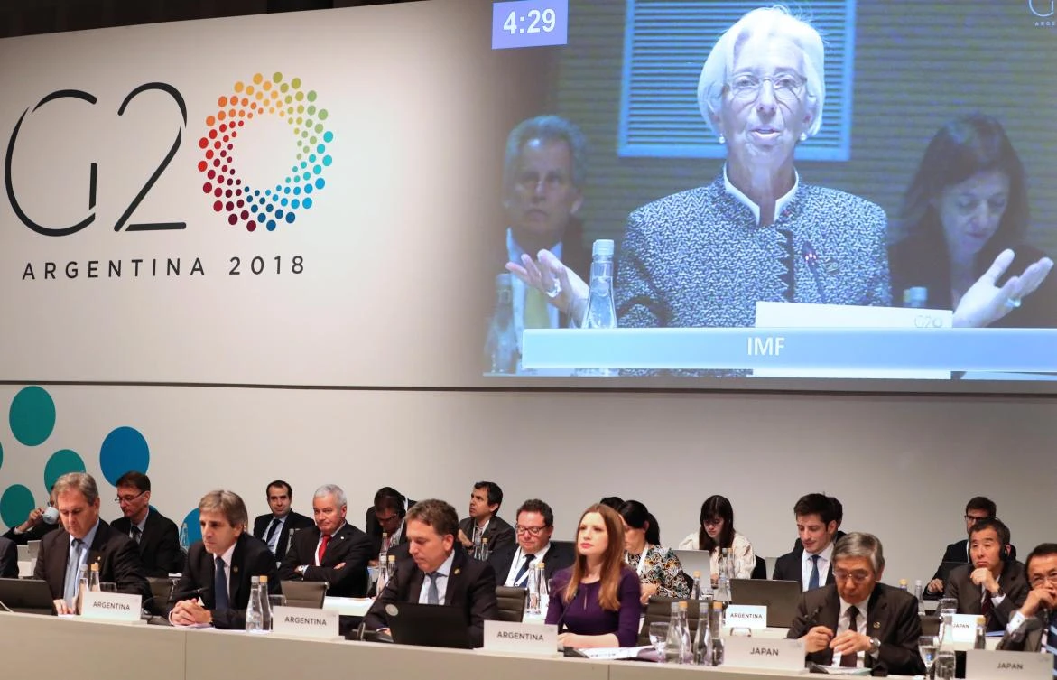 International Monetary Fund (IMF) Managing Director Christine Lagarde on a screen as she speaks during the G20 meeting of Finance Ministers and Central Bank Governors taking place in Buenos Aires, on July 21, 2018. (AFP / G20 Press Office)