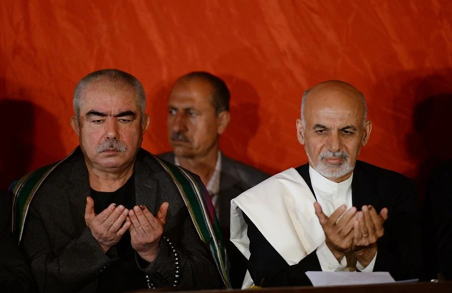 Dostum (left) left Afghanistan in May 2017 after he was accused of organizing the rape and torture of a political rival. (File Photo: AFP)