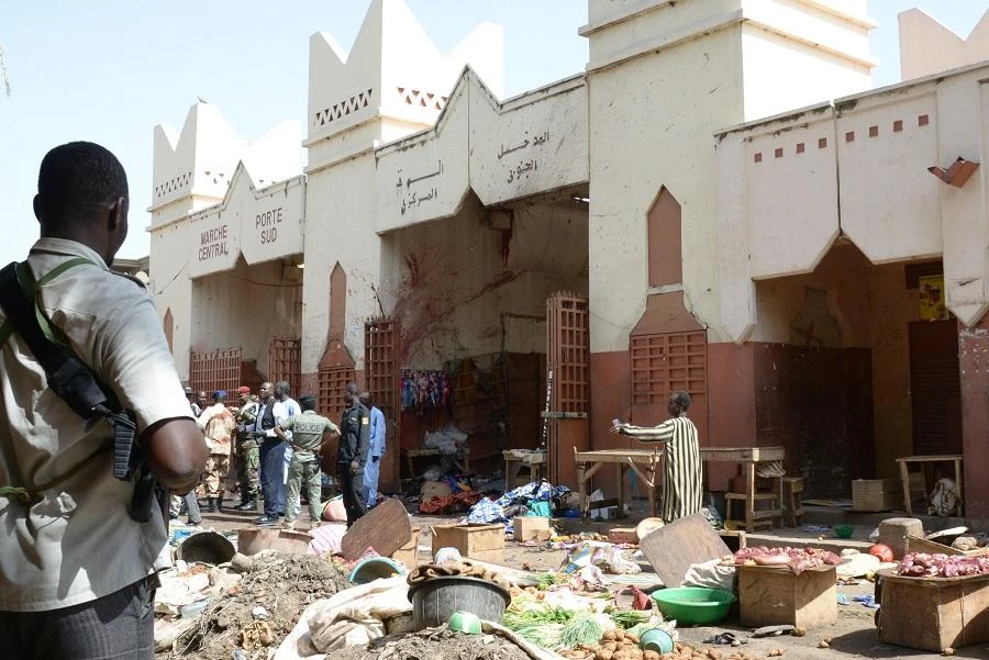 Soldiers and police forces stand guard at a market in N'Djamena following a suicide bomb attack. (File photo: AFP)