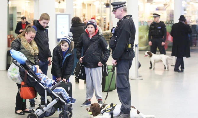 British police officers speak to members of the public in St Pancras station in London, in this file photo. (REUTERS)