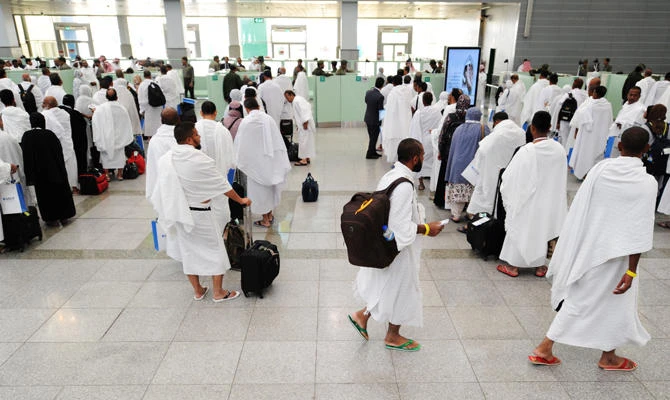Muslim pilgrims go through passport control upon their arrival at Jeddah airport in the Saudi capital on July 14,2018, prior to the start of the annual Hajj pilgrimage in the holy city of Makkah. (AFP)
