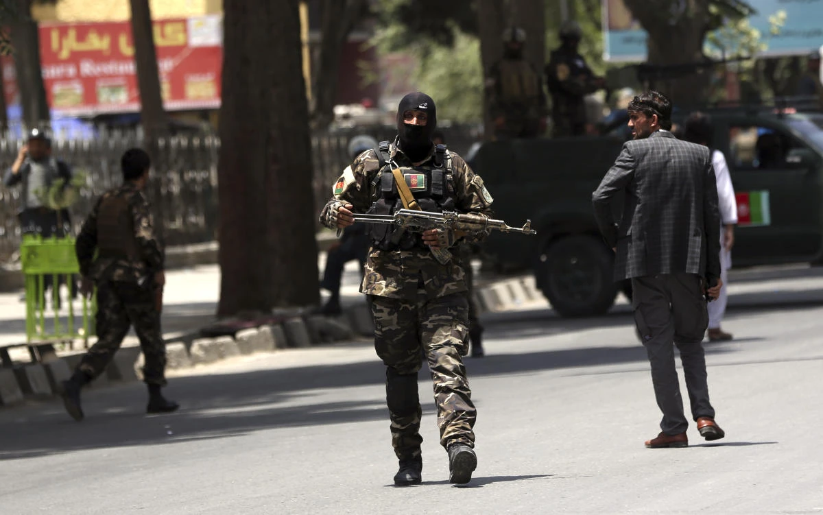 Security personnel patrol near a park where a would-be attacker was killed in Kabul, Afghanistan, Monday, July 16, 2018. (File photo: Massoud Hossaini/AP)