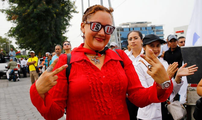 A supporter of Nicaragua's President Daniel Ortega takes part in a march in Managua, Nicaragua on Monday. (REUTERS)