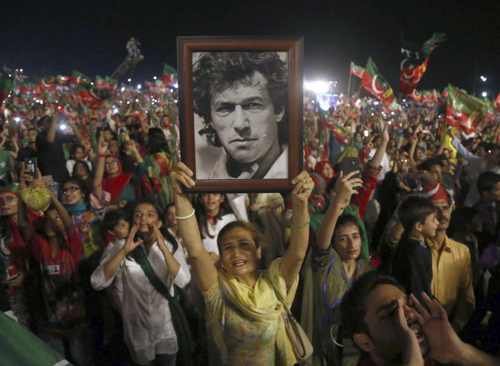 Imran Khan has drawn criticism by having his party field candidates chosen not on merit but on their likelihood to get elected — the so-called ‘electables.’ (AFP)