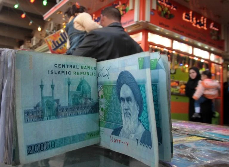 Bankruptcies at several unlicensed lenders — which had offered high interest rates and cheap loans with little capital to back them up — wiped out the savings of millions of Iranian depositors and has been a key driver of recent protests. (AFP)