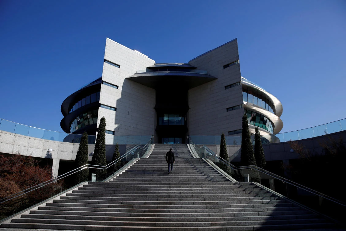 A man walks up stairs at the euro zone's largest bank Santander's headquarters in Boadilla del Monte. (Reuters)