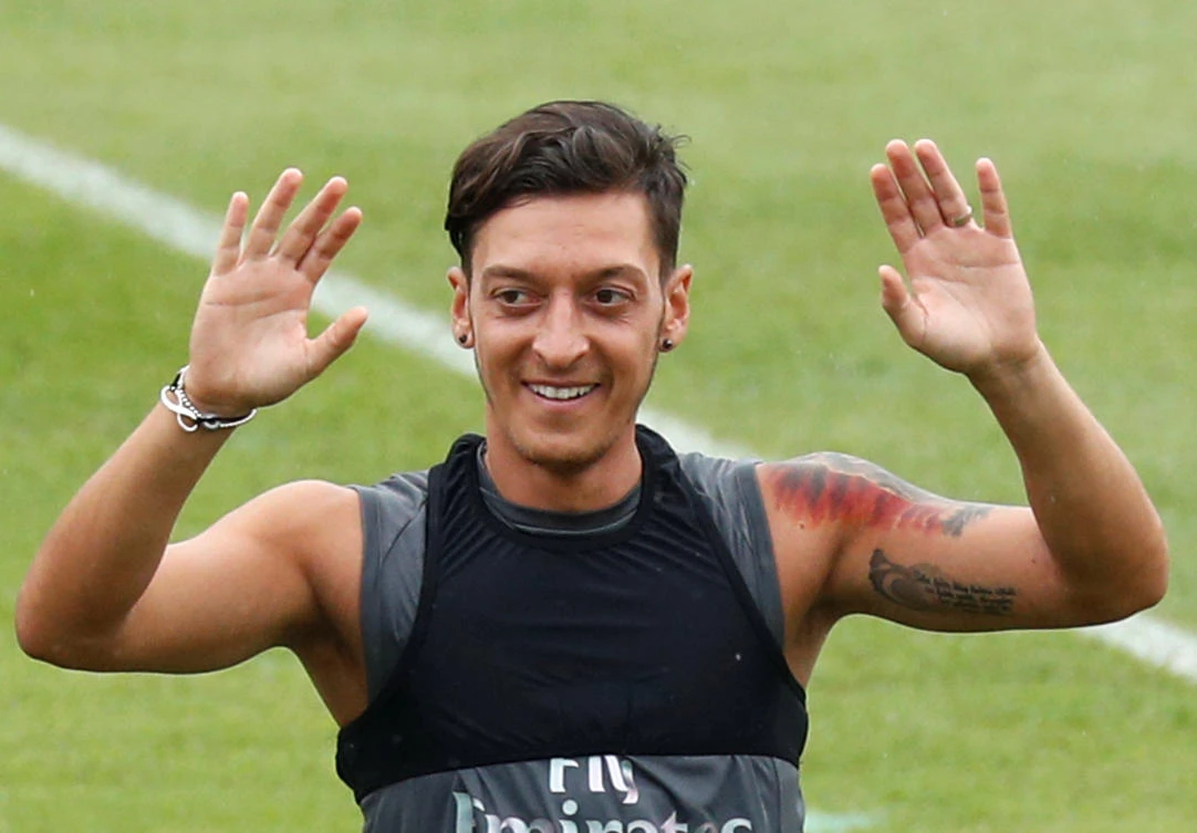 Mesut Ozil avoids talk of Germany retirement on Arsenal’s pre-season tour