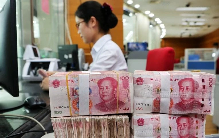 The Chinese government said it also would accelerate plans to reduce taxes by more than 1.1 trillion yuan ($160 billion) and to issue 1.35 trillion yuan in local government special bonds for infrastructure projects. (AFP)