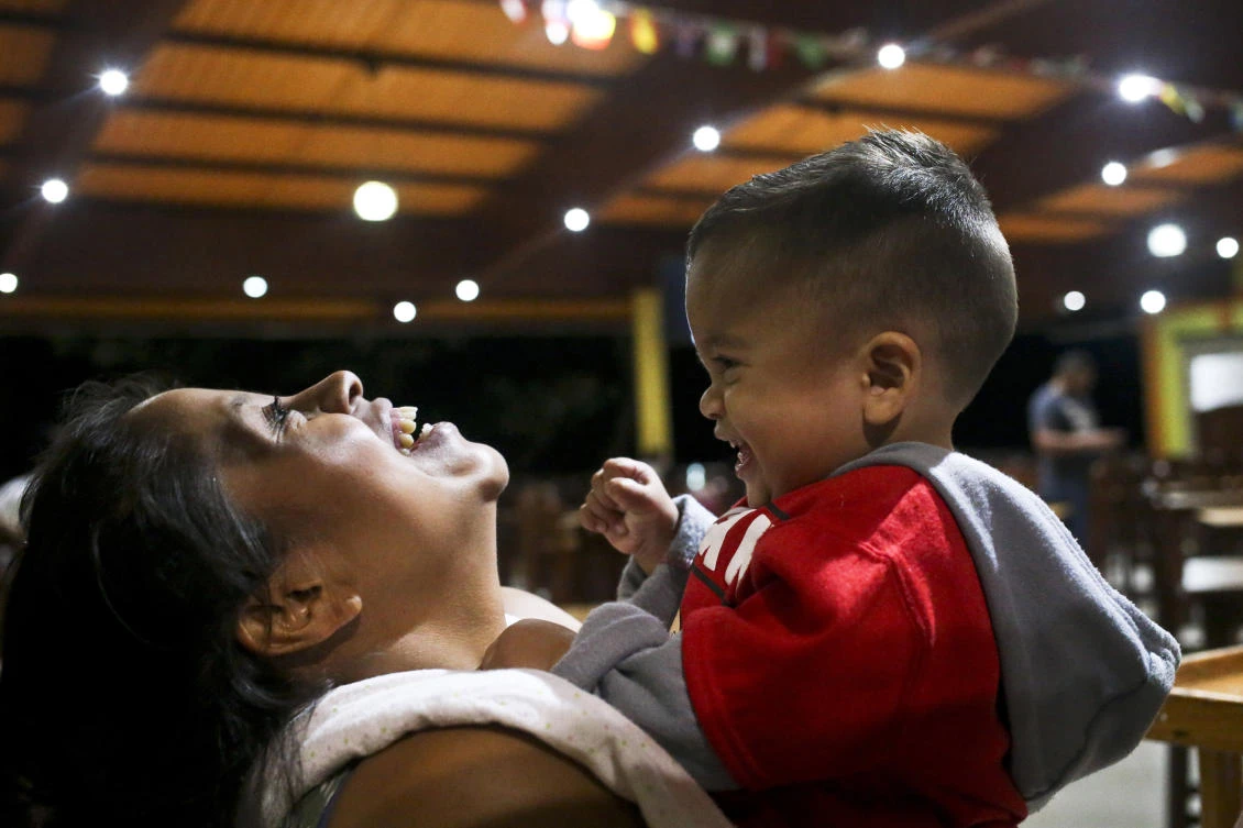 Adalicia Montecinos holds her 1-year-old son Johan, who became a poster child for the US policy of separating immigrants and their children, during the day there were reunited. (AP)
