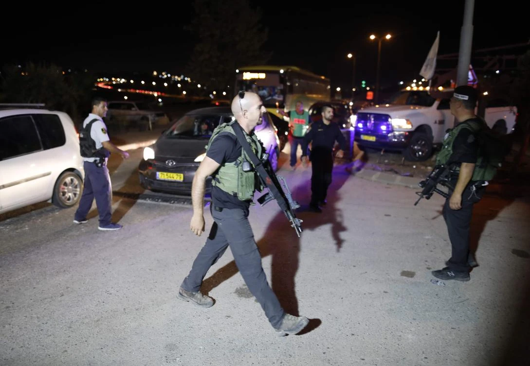 Israeli security forces at the Adam settlement in the occupied West Bank where a stabbing attack took place. (AFP)