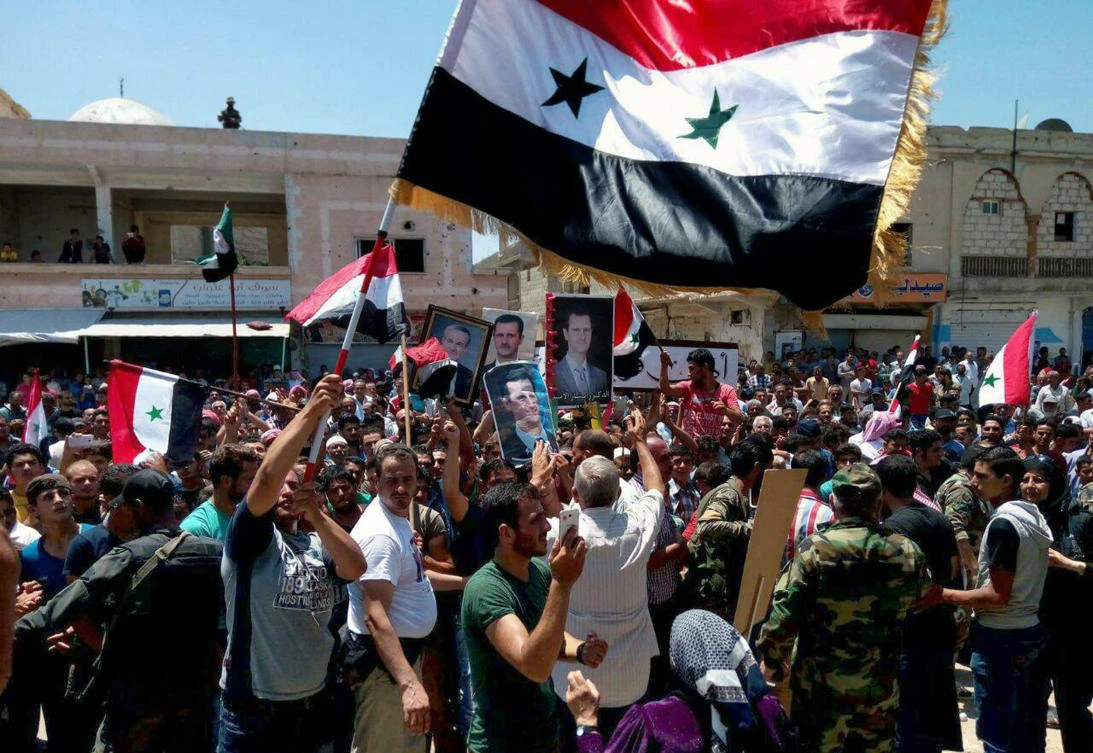 Syrians celebrate retaking town near Israel-occupied Golan