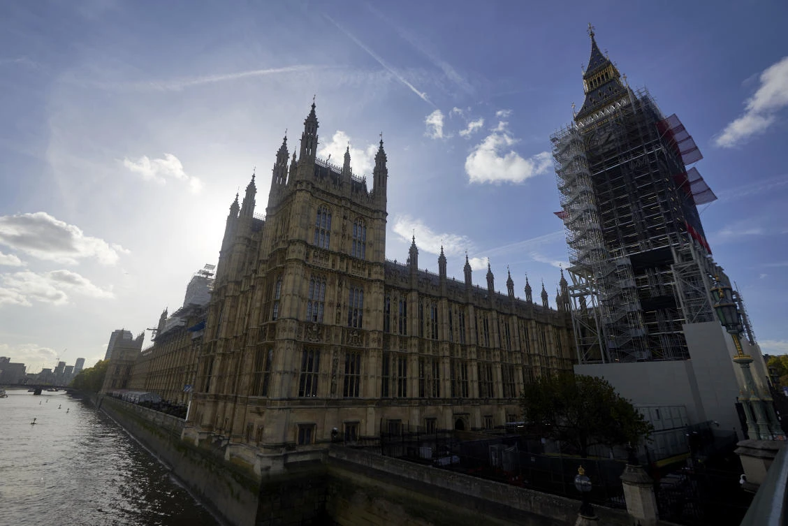British lawmakers say tech firms should be held to account for misleading information published on their sites. (File/AFP)