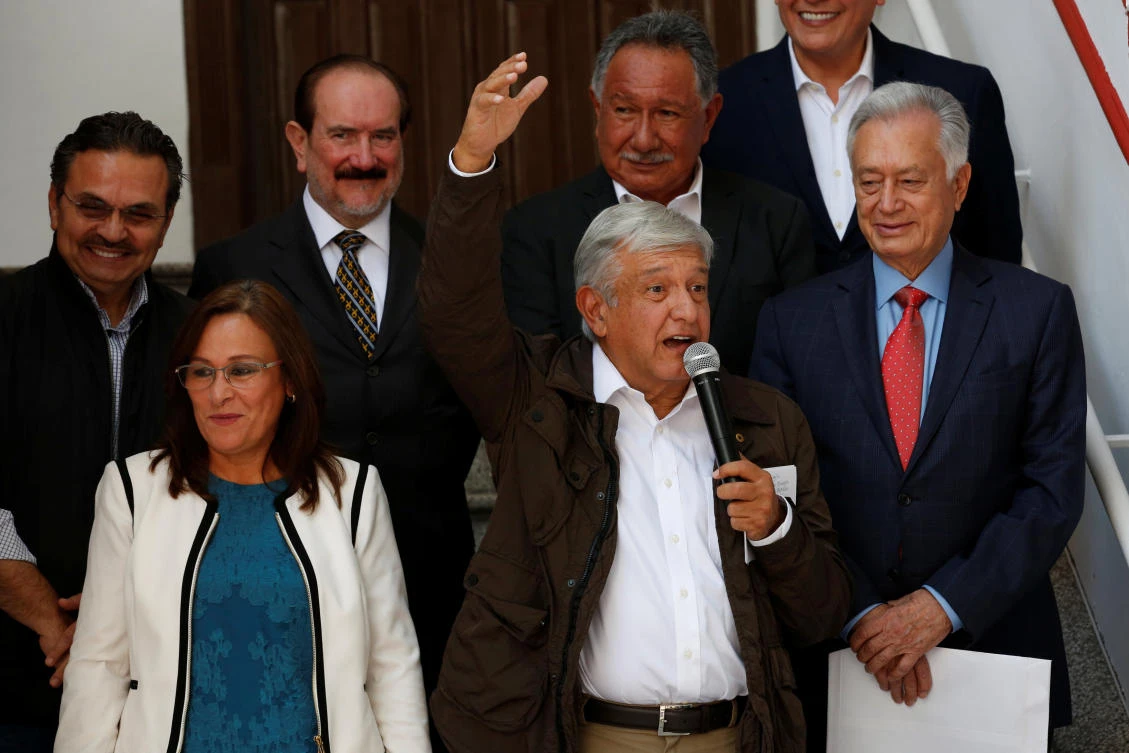 Mexico's president-elect Andres Manuel Lopez Obrador talks to the media next to his pick Energy Minister Rocio Nahle and Pemex's next chief executive Octavio Romero, at his campaign headquarters in Mexico City, Mexico July 27, 2018. (Reuters)