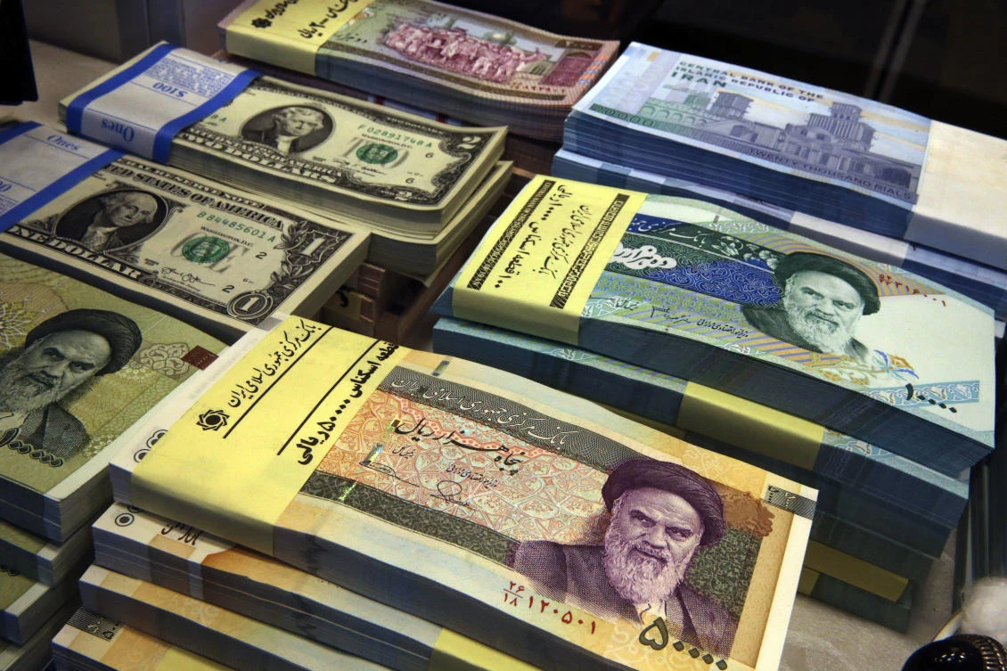 The Iranian rial fell to 112,000 to the dollar on Sunday, from 98,000 to $1 the day before (AP/Vahid Salemi, File)