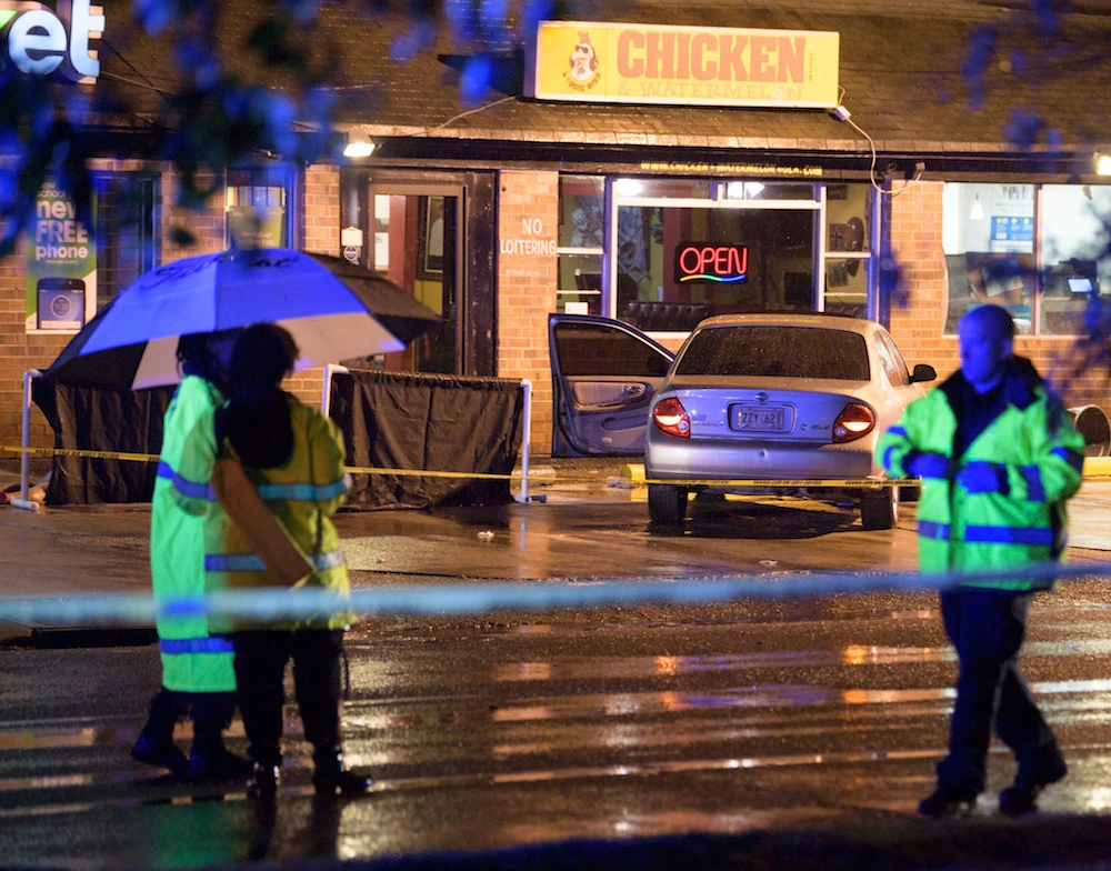 Investigators work the scene of a shooting in New Orleans, Saturday, July 28, 2018. (AP)