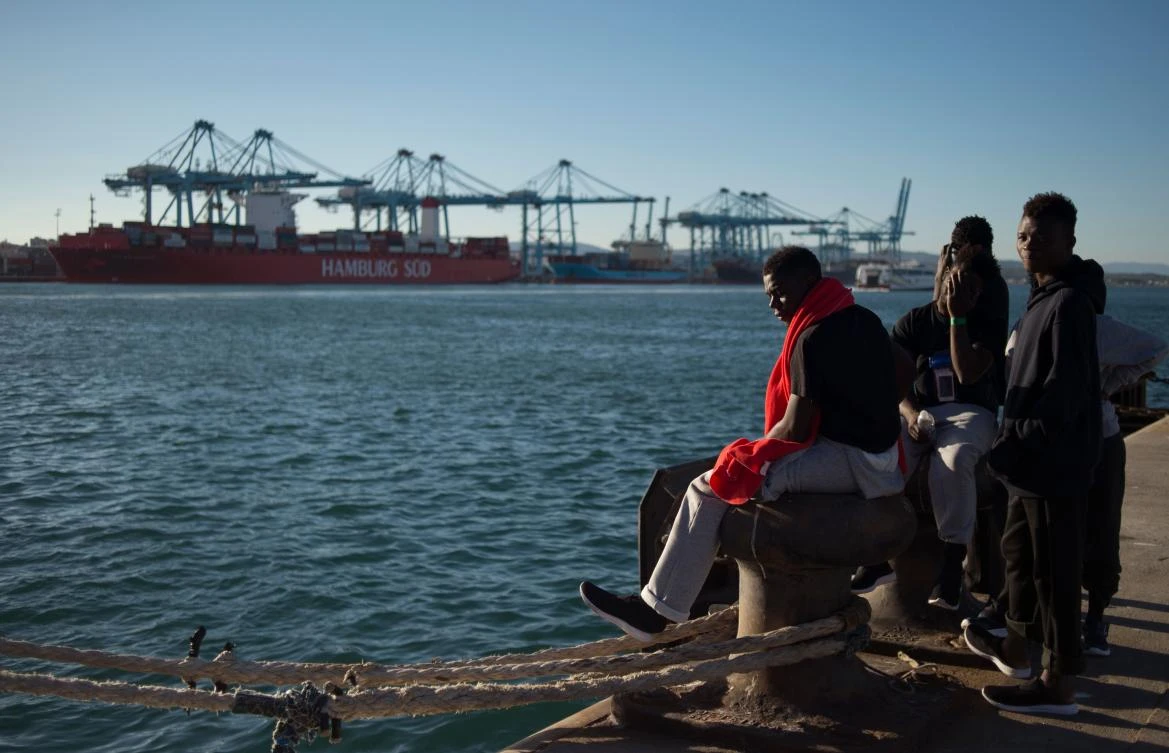 Migrants rescued at sea wait to be transferred at the harbour of Algeciras on July 28, 2018. (AFP)