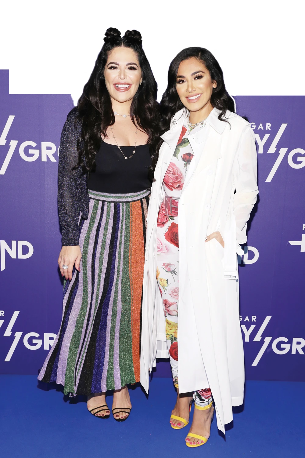 Mona (L) and Huda Kattan are set to launch their debut fragrance. (AFP)
