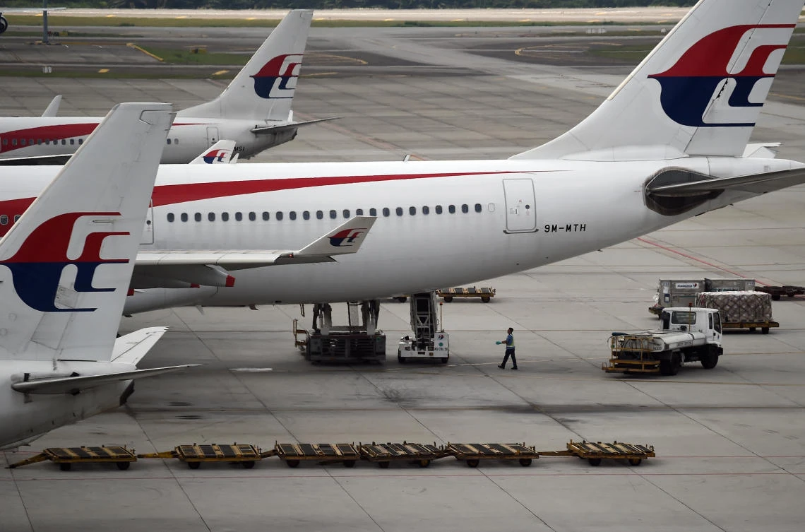 MH370 families say no new findings in investigation report, but highlights mistakes