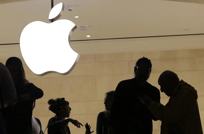 The iPhone maker is expected to extend its string of solid earnings and revenue growth with its latest quarterly report card. (Mark Lennihan/AP)
