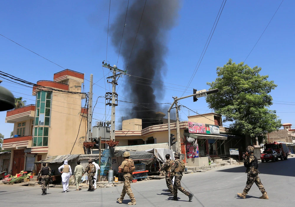 Gunmen kill at least 15 in attack on Afghan government building in Jalalabad