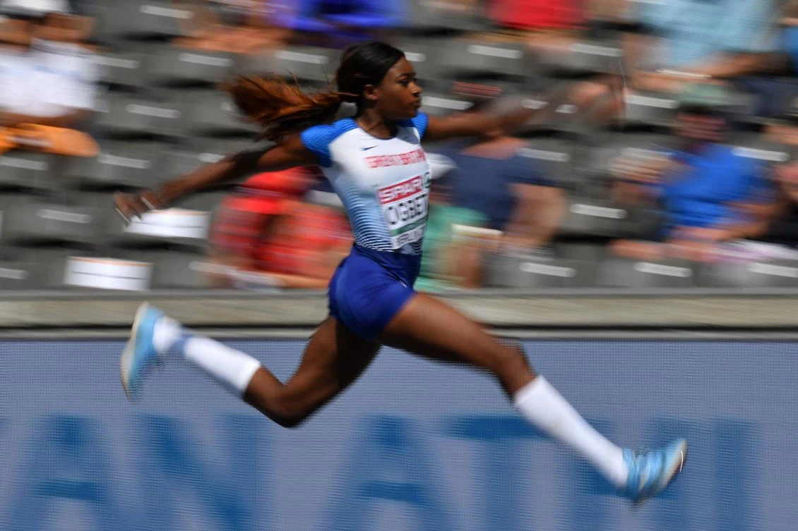 TOPSHOT - Great Britain's Naomi Ogbeta competes in the women's triple jump qualifying event during the European Athletics Championships at the Olympic stadium in Berlin on August 8, 2018. / AFP / Andrej ISAKOVIC