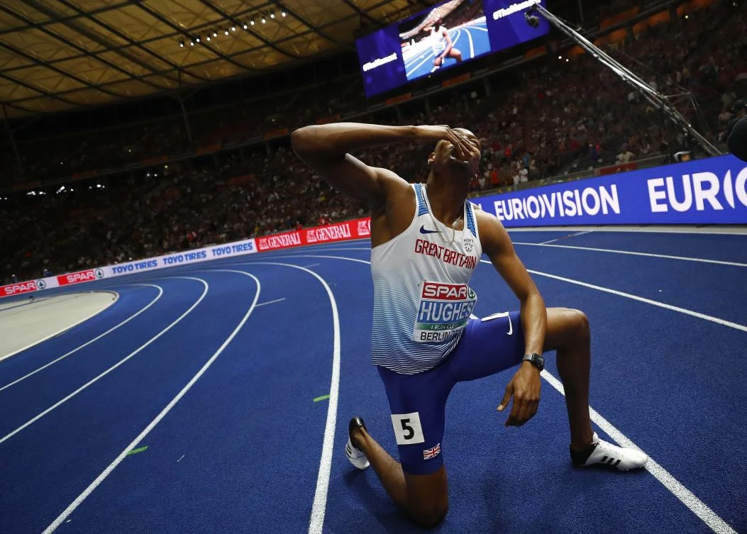 2018 European Championships - Men's 100 meters, Final - Olympic Stadium, Berlin, Germany - August 7, 2018 - Zharnel Hughes of Britain celebrates winning a gold medal. REUTERS/Kai Pfaffenbach