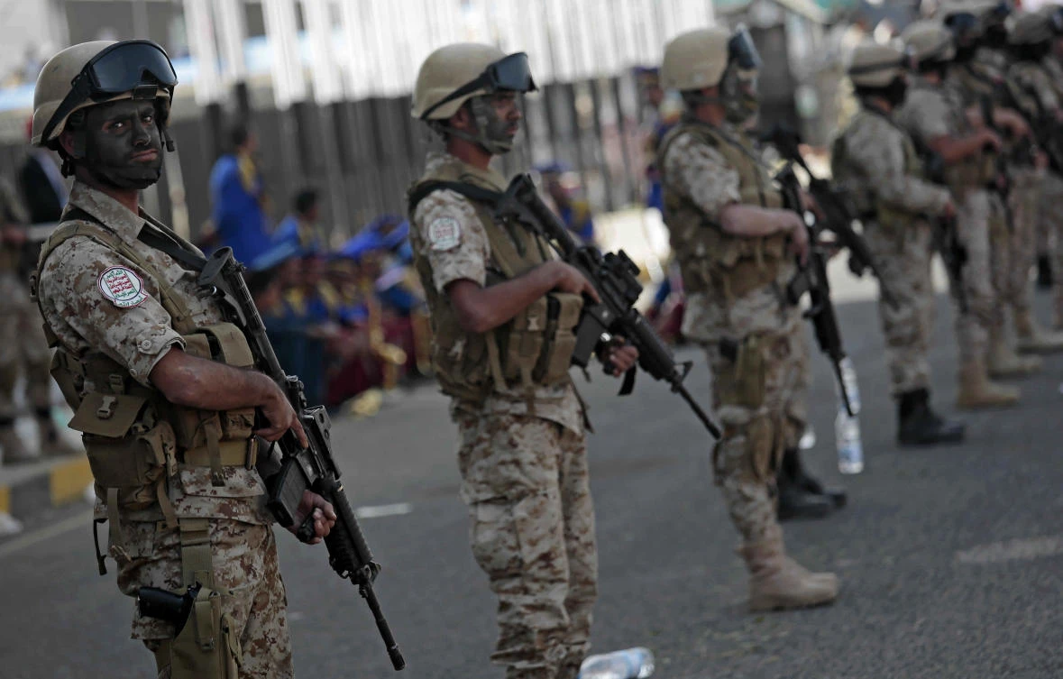 Houthi militants stand guard during a rally in the Yemeni capital, Sanaa. (File Photo: Hani Mohammed/AP)