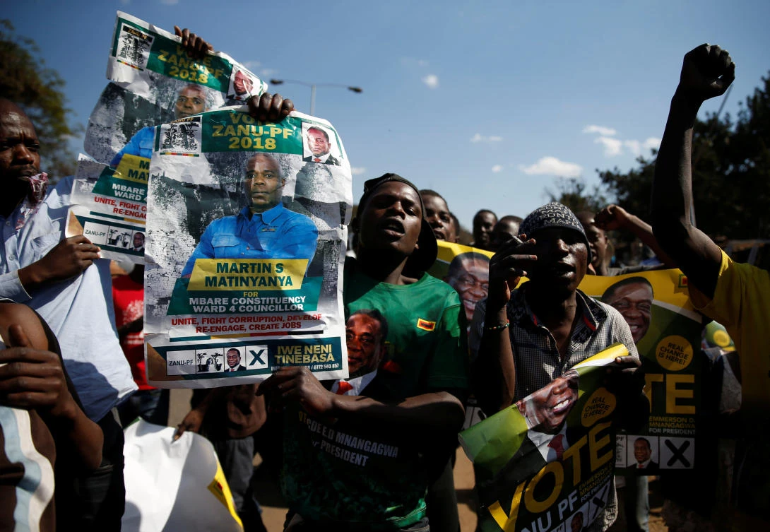 Three killed in Zimbabwe after vote as ruling party wins majority seats in parliament