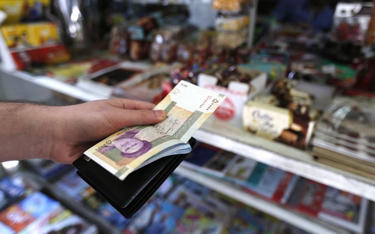 Iran's currency traded at a fresh record-low of 119,000 to the dollar on today, a loss of nearly two-thirds of its value since the start of the year as US sanctions loom. (AFP)