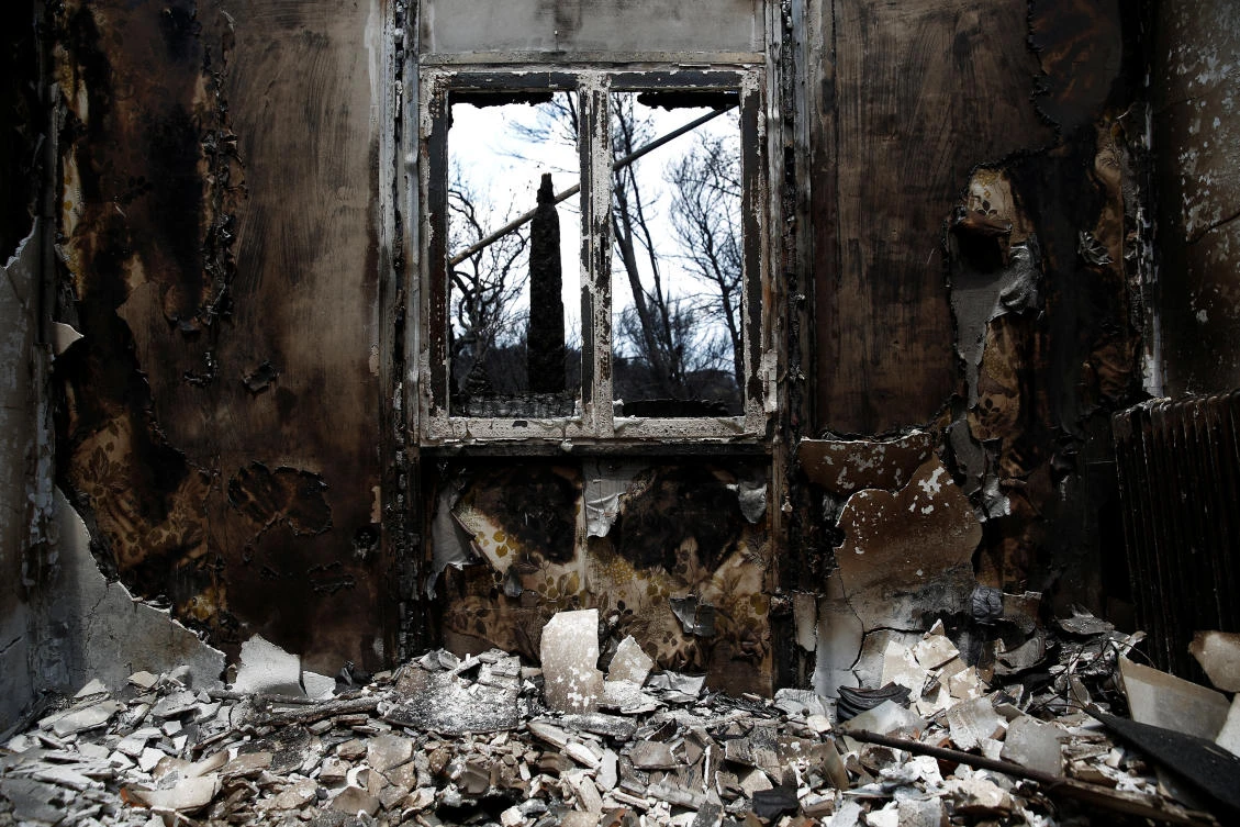 Greece vows to speed up destruction of illegal property after wildfires