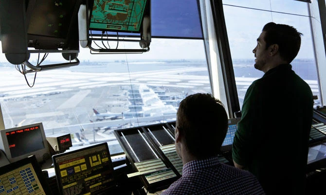 Air traffic controllers work in the tower at John F. Kennedy International Airport in New York. (AP file photo)