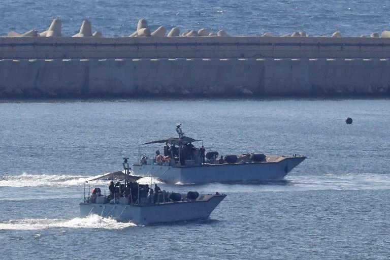 Israeli navy ships maneuver at the military port of Ashdod, southern Israel on Sunday, July 29, 2018 after intercepting a Norwegian-flagged boat trying to break its more than decade-long blockade of the Gaza Strip. (AFP)