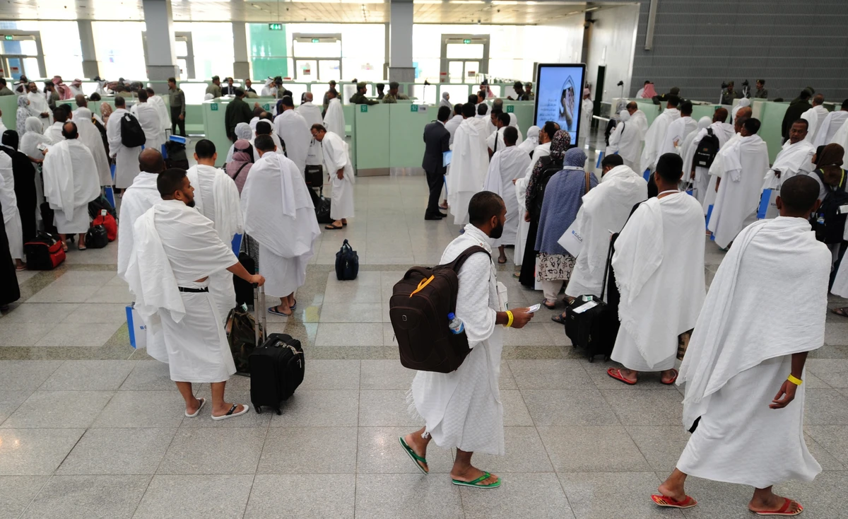 In this file photo, Muslim pilgrims go through passport control upon their arrival at Jeddah airport. (AFP)
