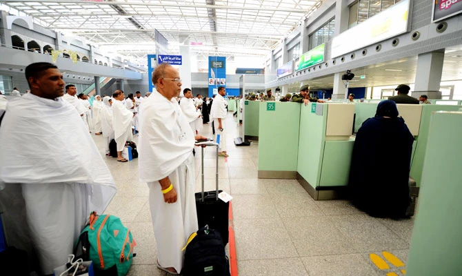 Muslim pilgrims go through passport control upon their arrival at Jeddah airport in this photo taken on July 14,2018. (AFP)